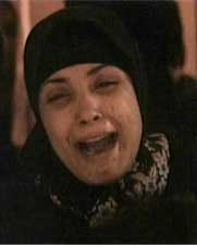 fig. 9, grieving Iraqi woman
