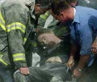 injured man helped by fire services